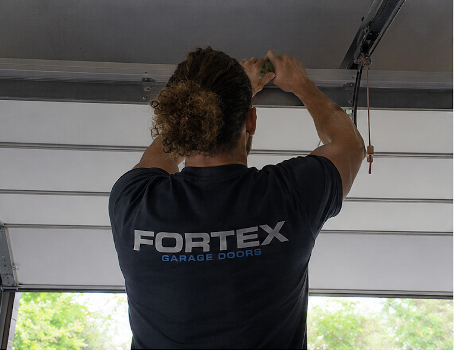 Garage door repairs Gold Coast — Fortex Door Services technician
