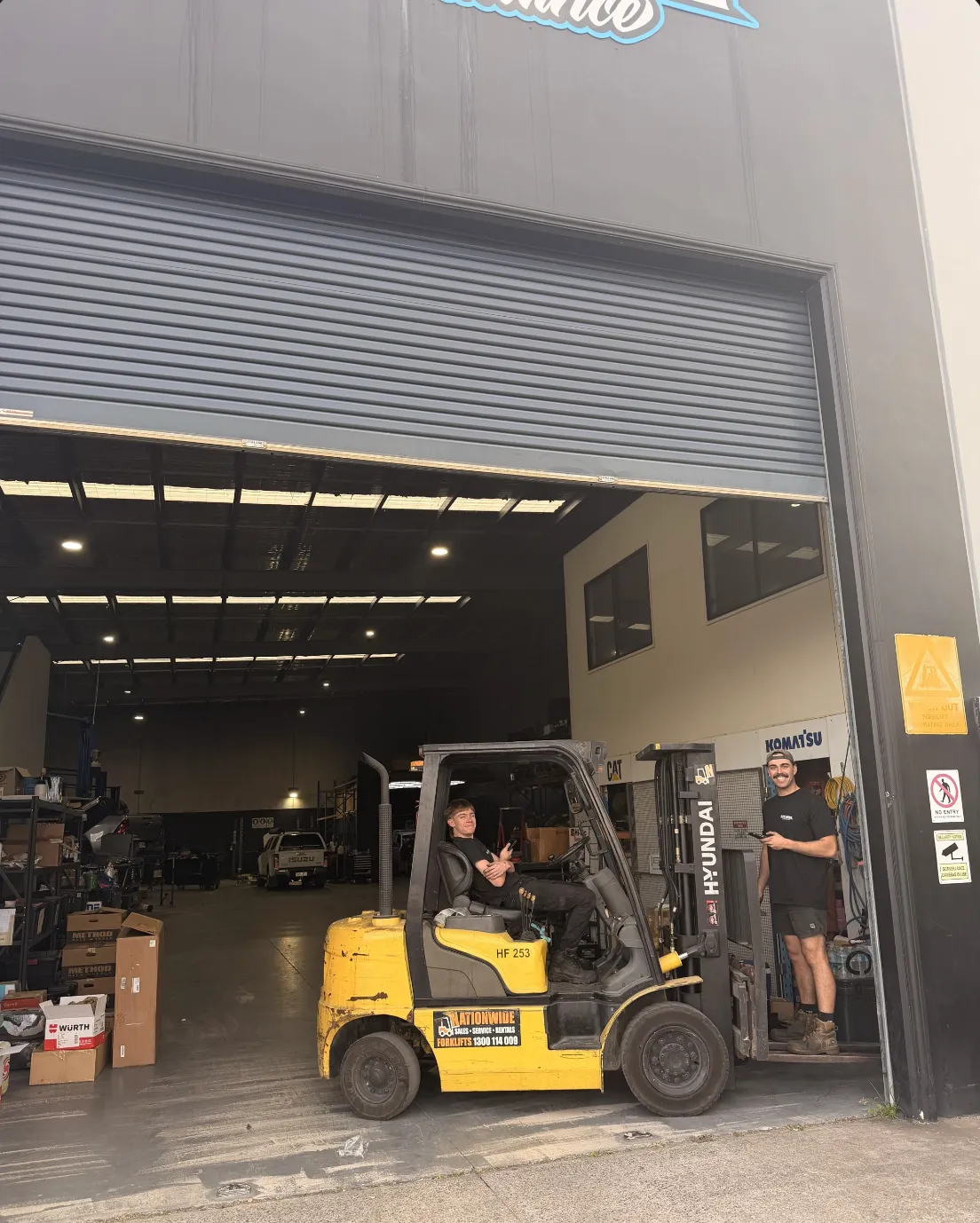 Commercial roller door at a Stapylton diesel performance workshop after motor upgrade and full service