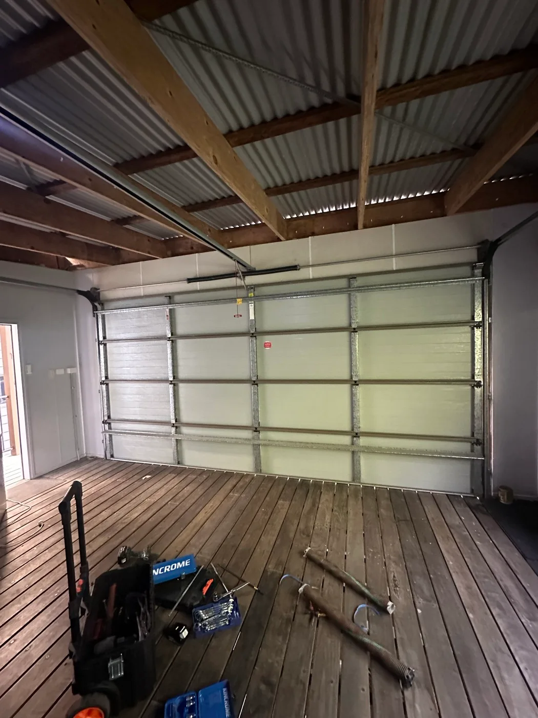 New garage door installation in progress Gold Coast