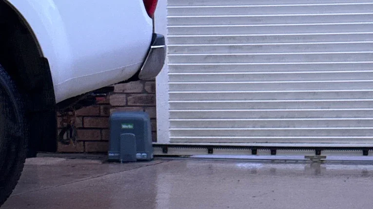 New Merlin sliding gate motor installed at the base of the gate in Varsity Lakes